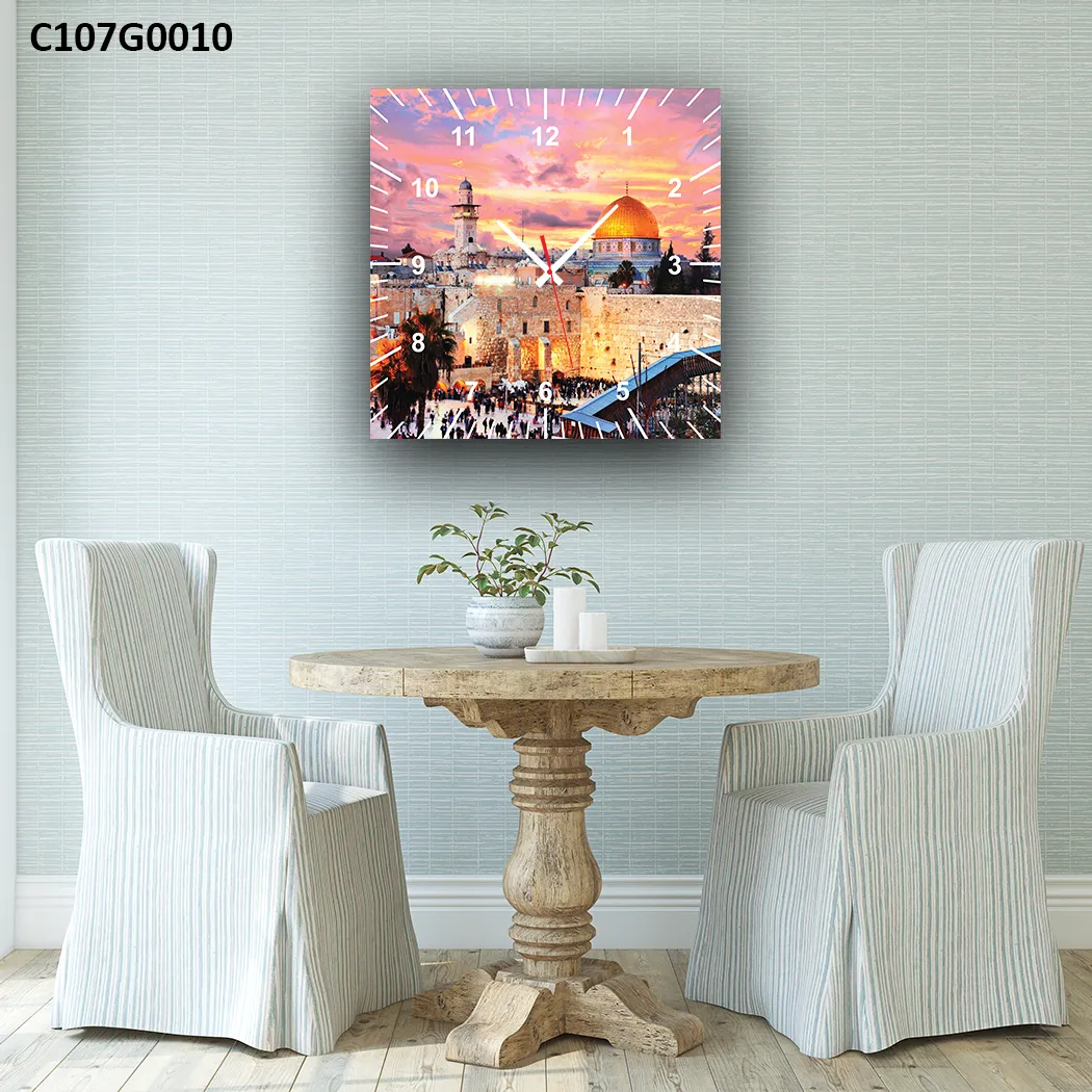 ساعة قبة الصخرة و القدس مساءً