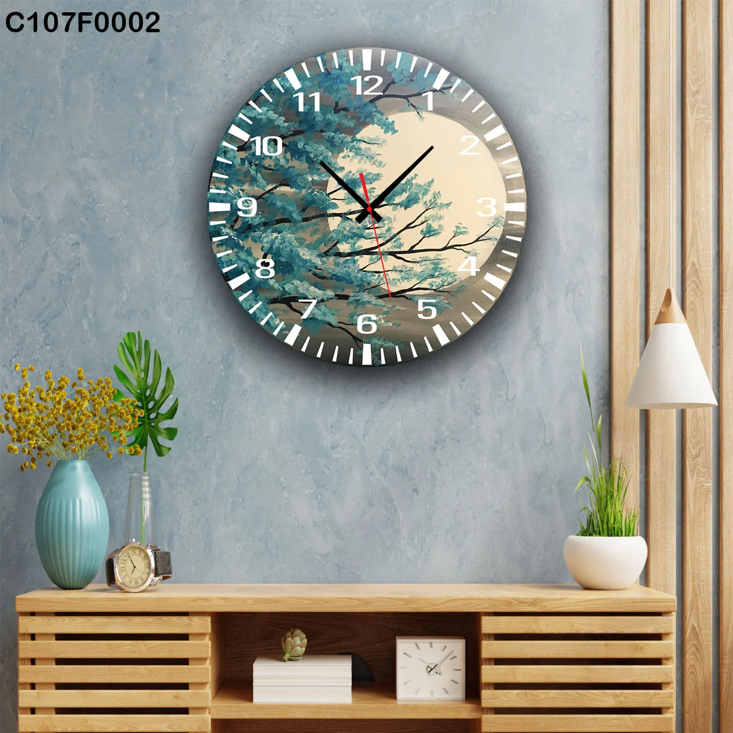 ساعة دائرية شجرة زرقاء ضوء القمر هادئة